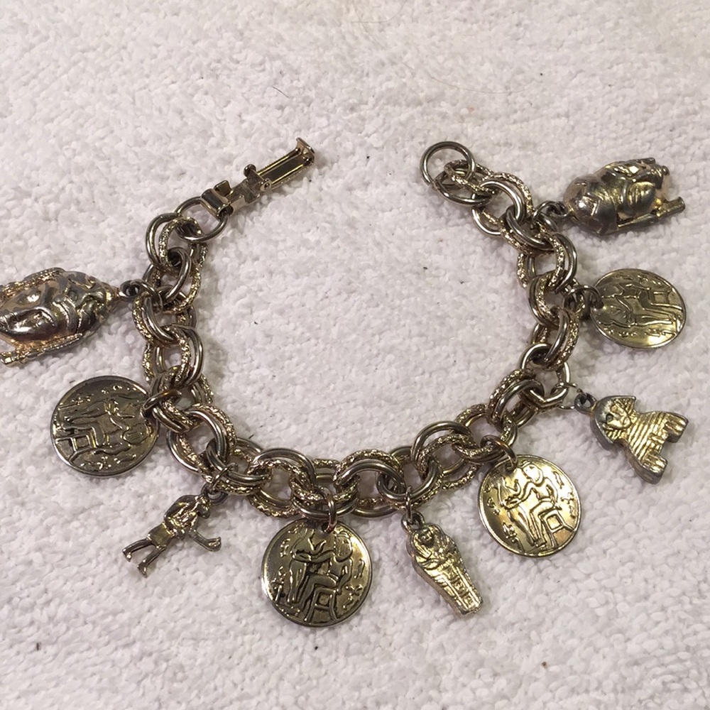 Vintage Egyptian 9-charm bracelet